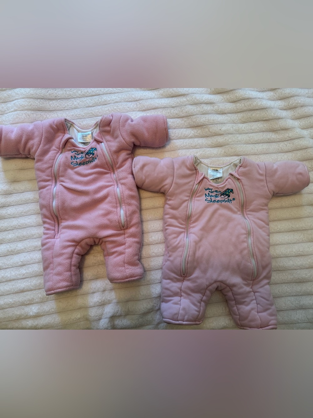 Lot of 2 baby Merlin’s Magic Sleepsuits, pink